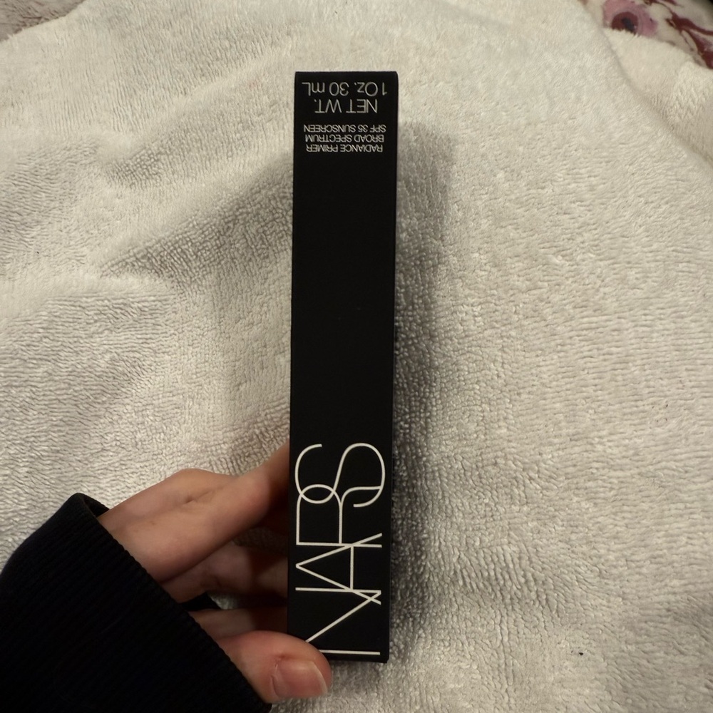 Nas radiant primer broad spectrum SPF 30 sunscreen.